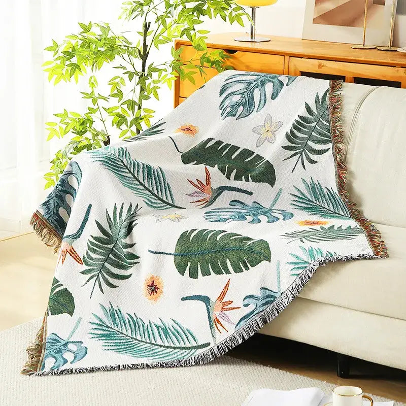White throw blanket with tropical leaf and flower pattern and fringed edges for decorbites leopard print decor
