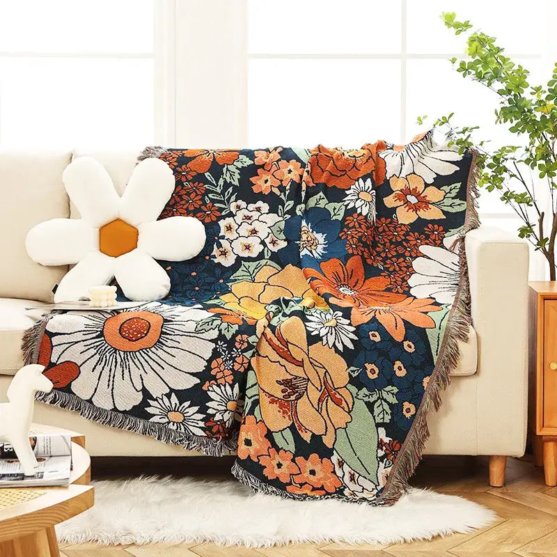 A cozy navy blue print throw blanket with vibrant floral pattern and fringed edges for decorbites leopard print decor