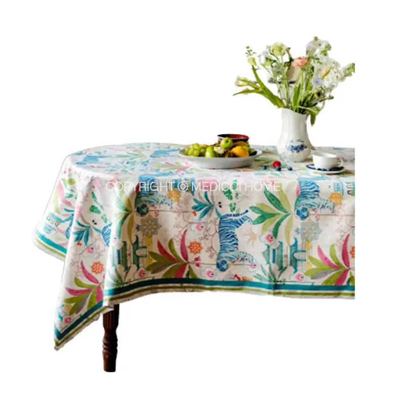 Jungle vibes tablecloth cream with blue striped cats and tropical foliage for decorbites jungle kitchen decor