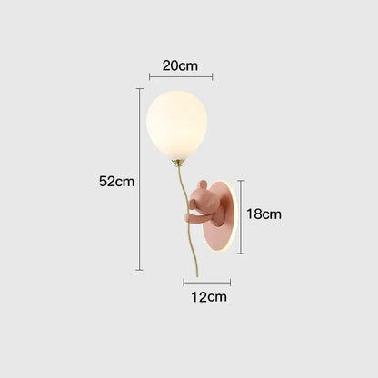 Pastel pink bear balloon wall light with frosted glass balloon and gold-toned stem by decorbites for children bedroom
