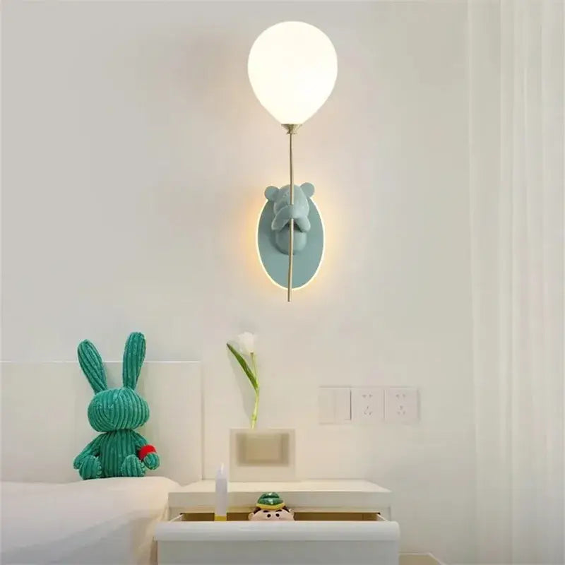 Kawaii gold bear balloon wall light with a soft glowing balloon sconce and light blue bear figure for children bedroom decor