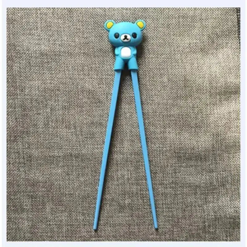 Blue rilakkuma-themed silicone kids bear panda chopstick holder with yellow ears and white belly for dining training gift
