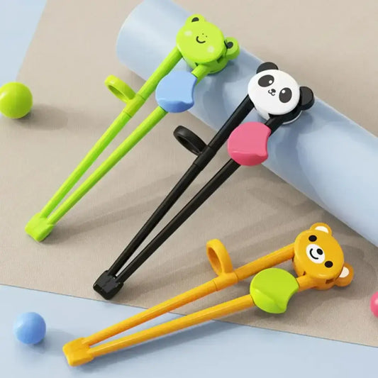 Brightly colored plastic kids multicolor bear panda and cat training chopsticks with animal-shaped handles for dining room use