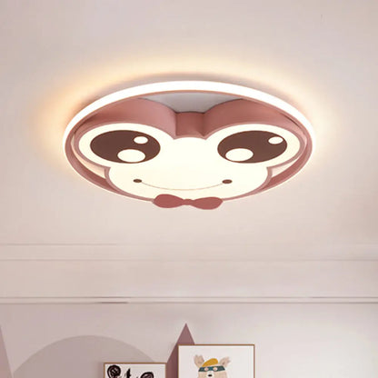 Lámpara de techo LED empotrada DecorBites™ para habitación infantil: diseño de rana de ojos grandes en metal, color rosa/amarillo/azul.
