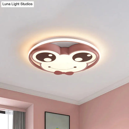 Lámpara de techo LED empotrada DecorBites™ para habitación infantil: diseño de rana de ojos grandes en metal, color rosa/amarillo/azul.