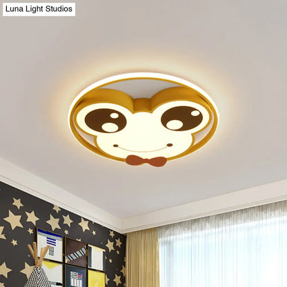 Lámpara de techo LED empotrada DecorBites™ para habitación infantil: diseño de rana de ojos grandes en metal, color rosa/amarillo/azul.
