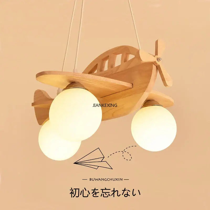 Kids wood airplane pendant light with three frosted glass bulbs in a wooden decorbites kids wood airplane design