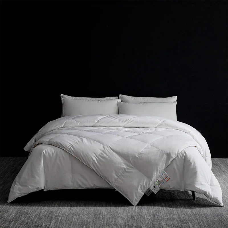 King size white quilted goose down and silk duvet set with soft plush texture and subtle stitching patterns