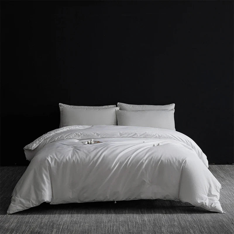 King size white satin duvet cover set with subtle lace trim made of goose down and silk for master bedroom luxury