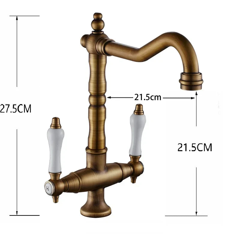 Antique brass single hole kitchen faucet with white ceramic handles and 360 degree swivel curved spout for hot and cold water