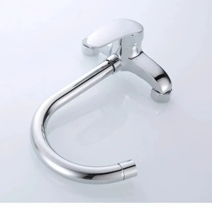 Chrome-finished wall mounted kitchen hot and cold water mixing faucet with single handle and sleek curved spout