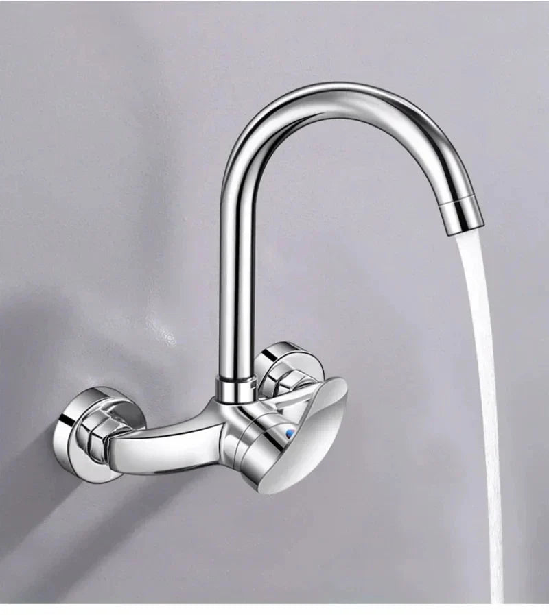 Chrome finished wall mounted kitchen faucet with sleek curved spout and dual control knobs for hot and cold water mixing