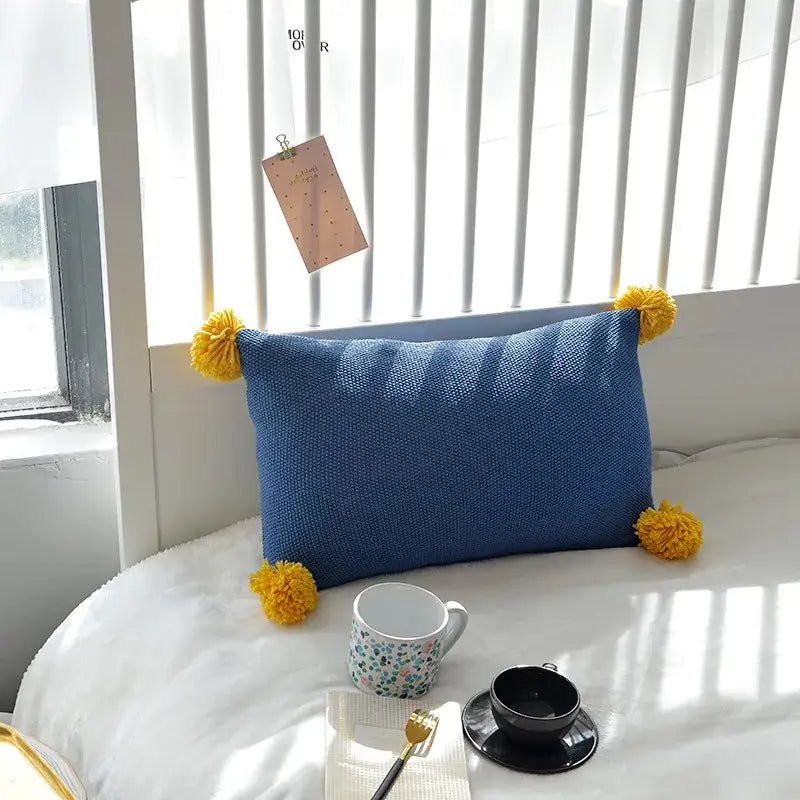 Blue knitted knit cushion cover with yellow pom-poms by decorbites for living room cushion cover set