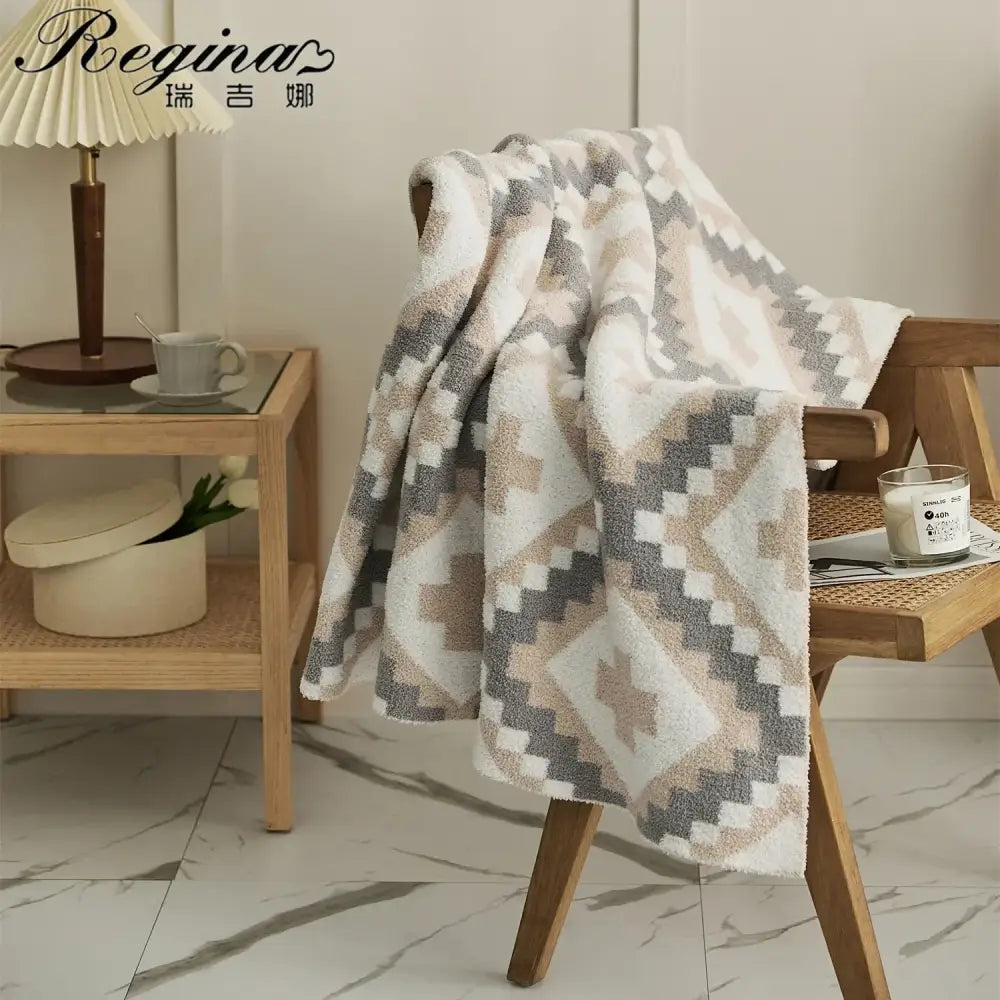 Decorbites knitted geometric quilt blanket in cream and gray with a plush textured weave for cozy living room decor