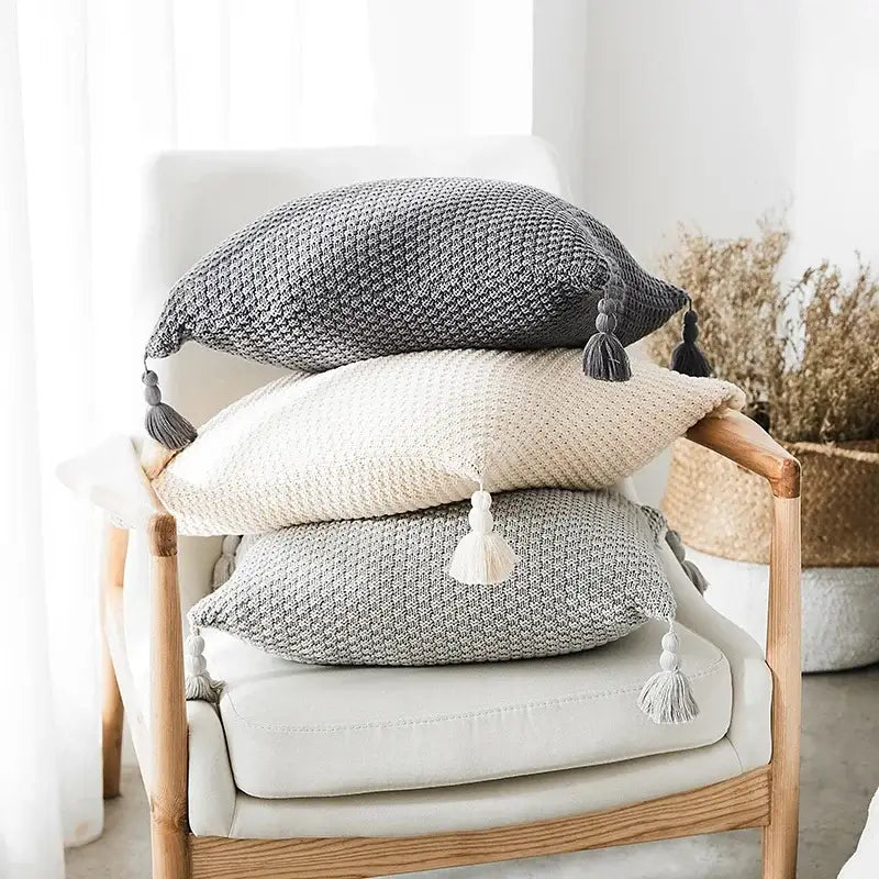 Stacked decorbites knitted grey ivory pillow cover set with geometric knit and tassel accents for living room decor