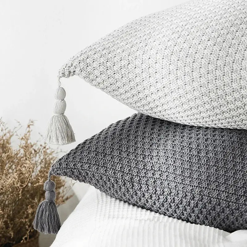 Knitted grey ivory pillow cover set with textured patterns and tassels by decorbites for living room decor