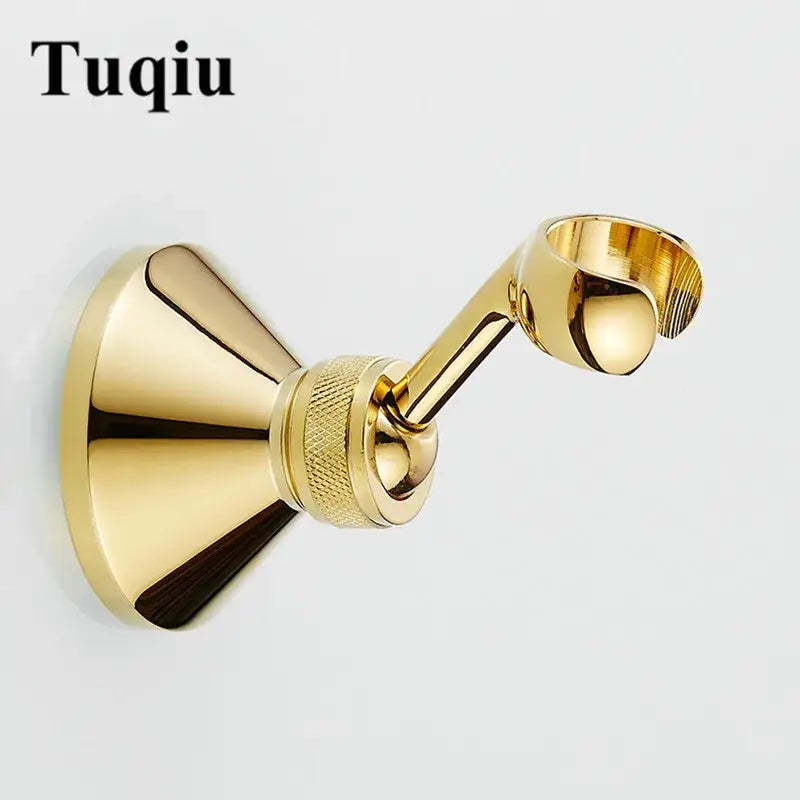 Gold-colored knurled brass shower head holder wall mount with polished metallic finish and textured adjustment knob grip
