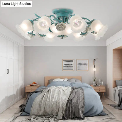 Teal and white glass petal ceiling light fixture from decorbites korean garden flower collection for bedroom use