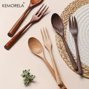 Korean style natural wooden fork and spoon set in smooth finished natural wood tones for dining room use