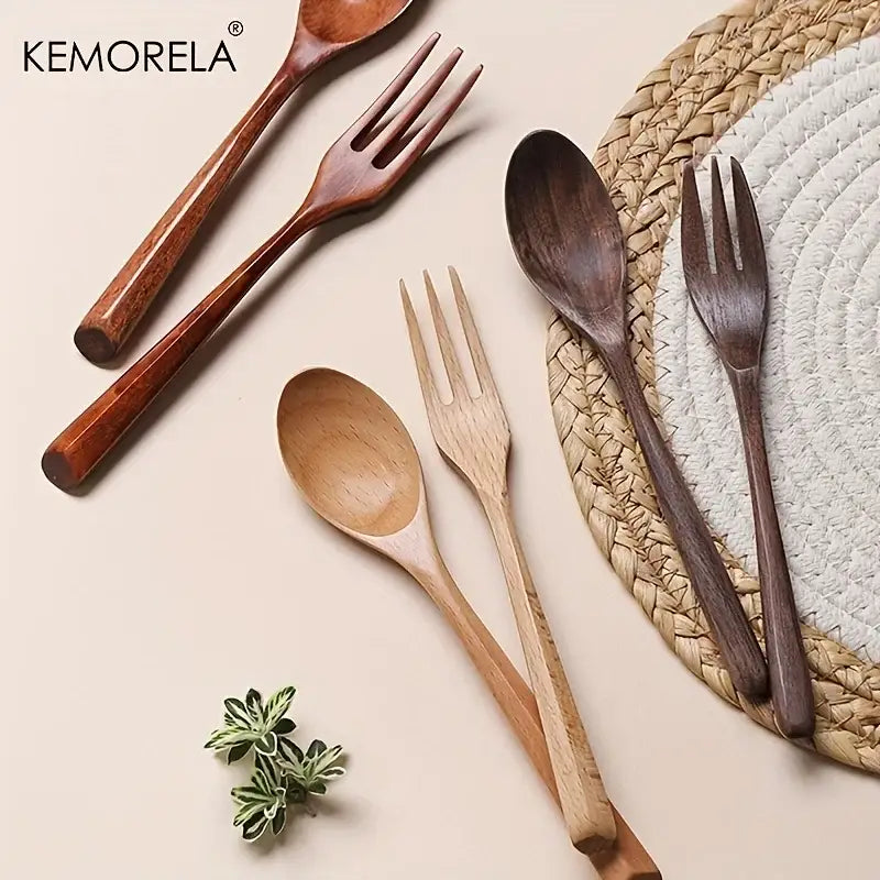 Korean style natural wooden fork and spoon set in smooth finished natural wood tones for dining room use