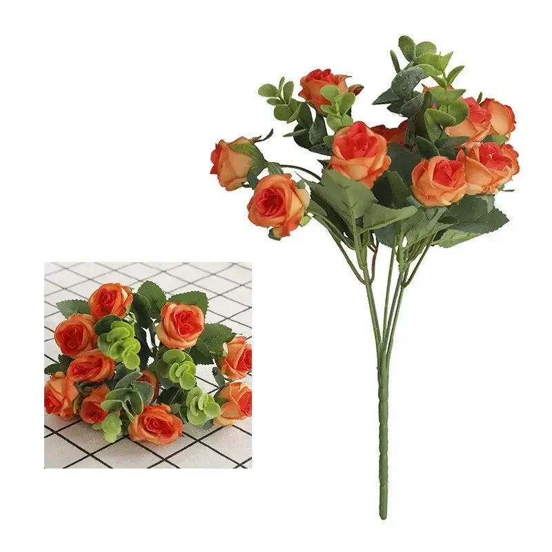 A bouquet of artificial orange roses with green leaves made from synthetic material for home decor and roses bouquet display