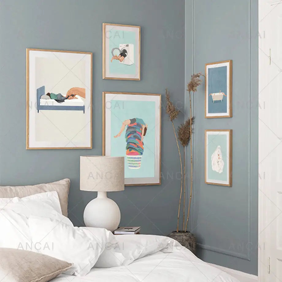 Set of five framed laundry girl wall art prints with pastel backgrounds in light wood frames for Nordic home decor