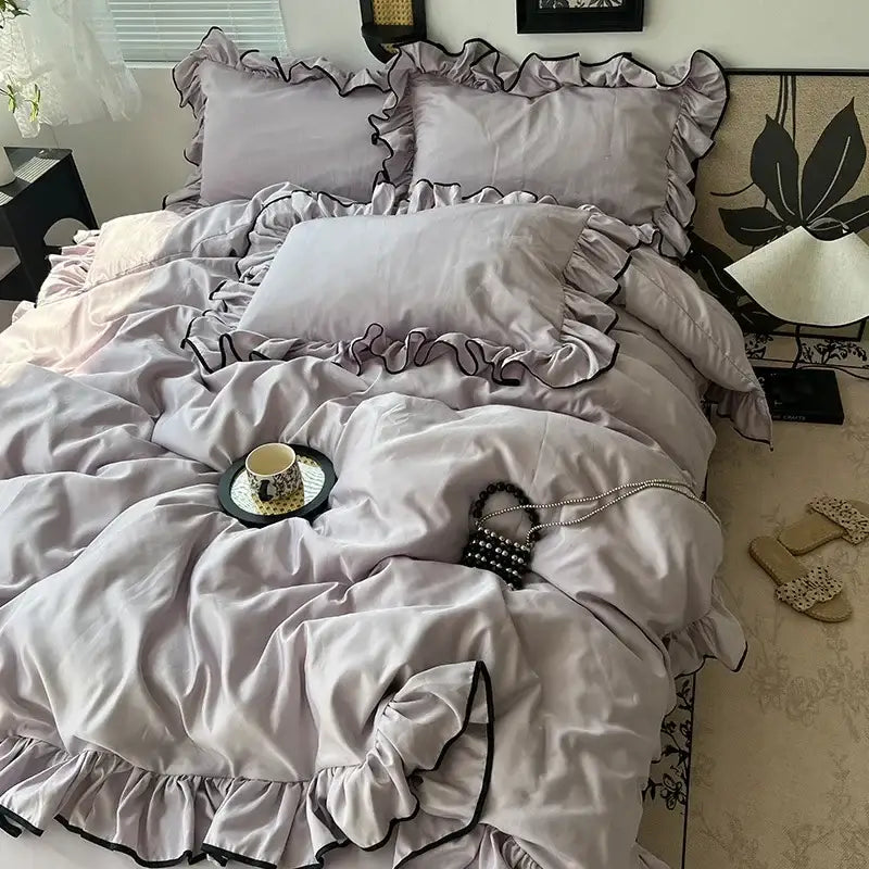Soft lavender satin bedding set with delicate black ruffled trim and matching pillows for decorbites cooling silky ruffled use
