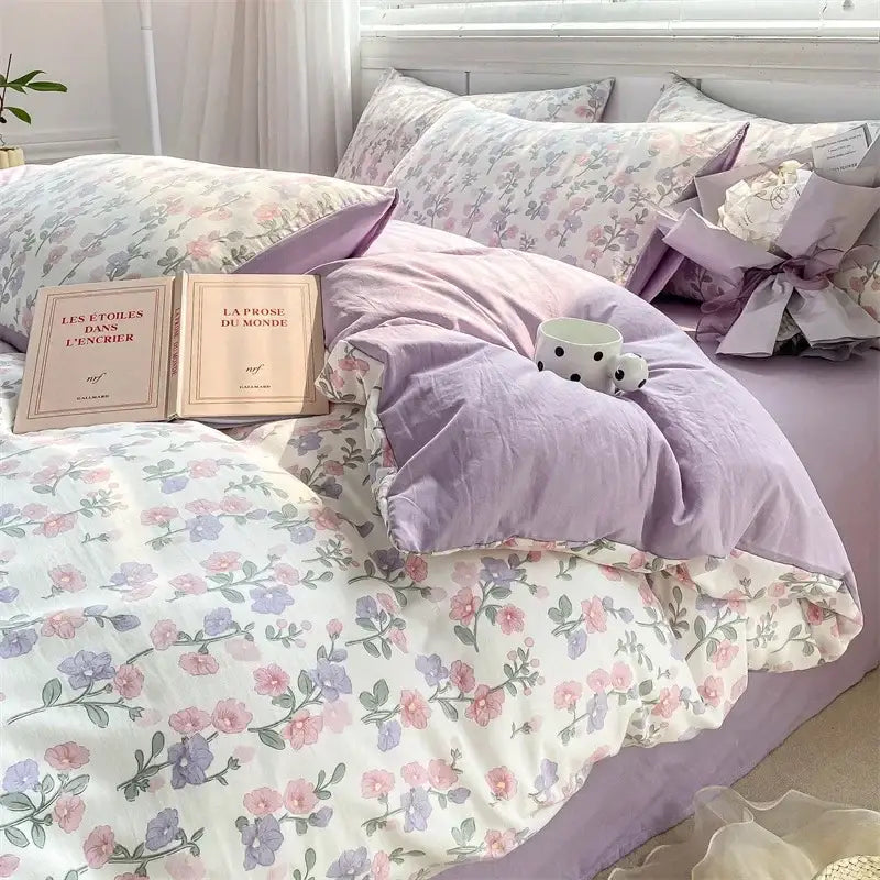 Lavender and pink floral double layer yarn bed sheet set with soft cotton fabric featuring delicate pastel blossoms