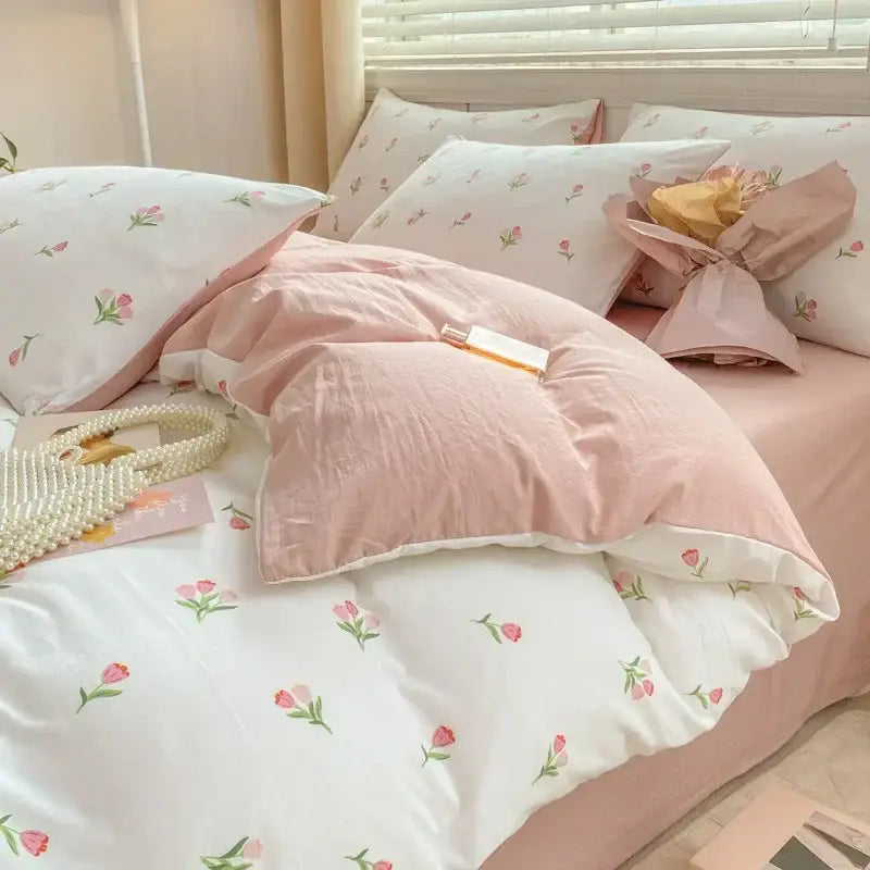 Lavender and pink floral double layer yarn bed sheet set with pink and white tulip pattern for a cozy bedroom