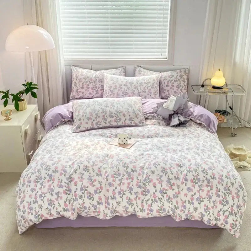 Lavender and pink floral bed sheet set with double layer yarn and soft ruffled edge for a cozy bedroom decor