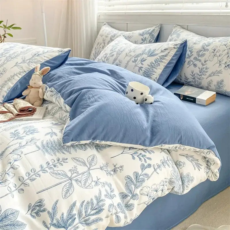Lavender and pink floral double layer yarn bed sheet set with blue and white botanical print duvet and soft textured fabric