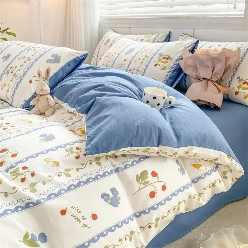 Blue and white bed sheet with embroidered berry vines in double layer yarn cotton for a layer yarn cozy bedroom