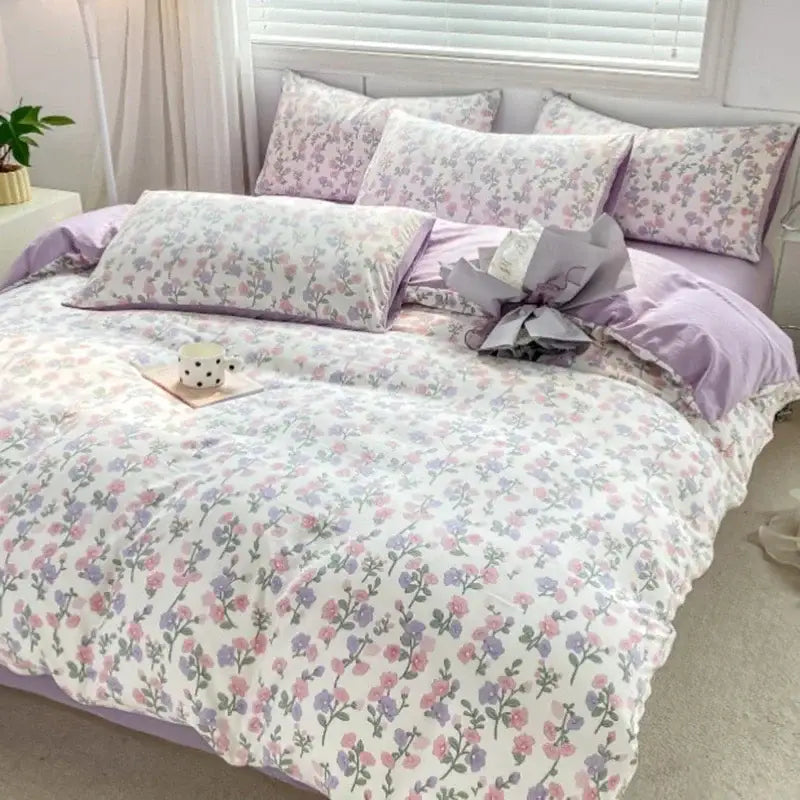 Lavender and pink floral double layer yarn bed sheet set with a soft cozy design for a romantic bedroom ambiance