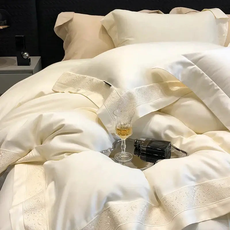 Cream-colored satin bedding set with delicate lace trim from lavender and silver decorbites 1200tc luxury embroidery collection