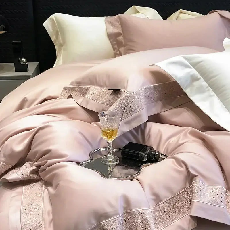 Lavender and silver 1200tc luxury embroidery bedding set featuring a blush pink satin duvet with lace trim and cream piping
