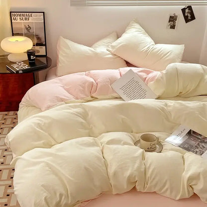 Cream-colored plush quilted cotton bedding set with soft pink accents for a lavender and black cotton bedding bedroom