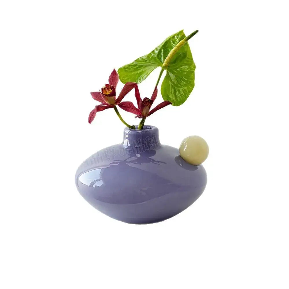 Lavender smooth glossy ceramic vase with pale yellow accent for living room decor by decorbites geometric glass