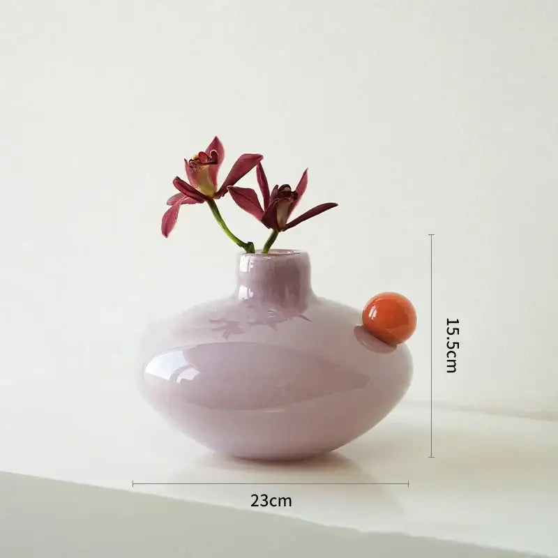 Lavender and blush pink geometric glass vase with matte lavender ceramic body and orange accent for decorbites geometric decor