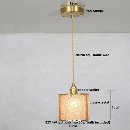 Gold-toned pendant light with textured crystal glass led shade and adjustable copper wire suspension by decorbites