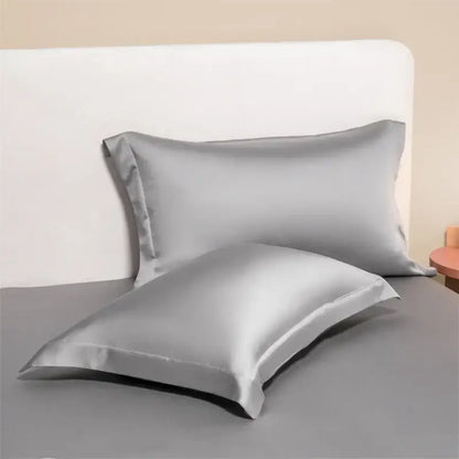 Silver satin pillowcases with a smooth glossy finish from a lavender egyptian cotton pillowcase set for bedroom bedding covers