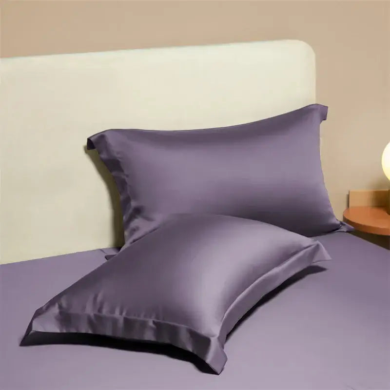 Two elegant lavender egyptian cotton pillowcases with a smooth satin finish in a cotton pillowcase set for bedroom bedding