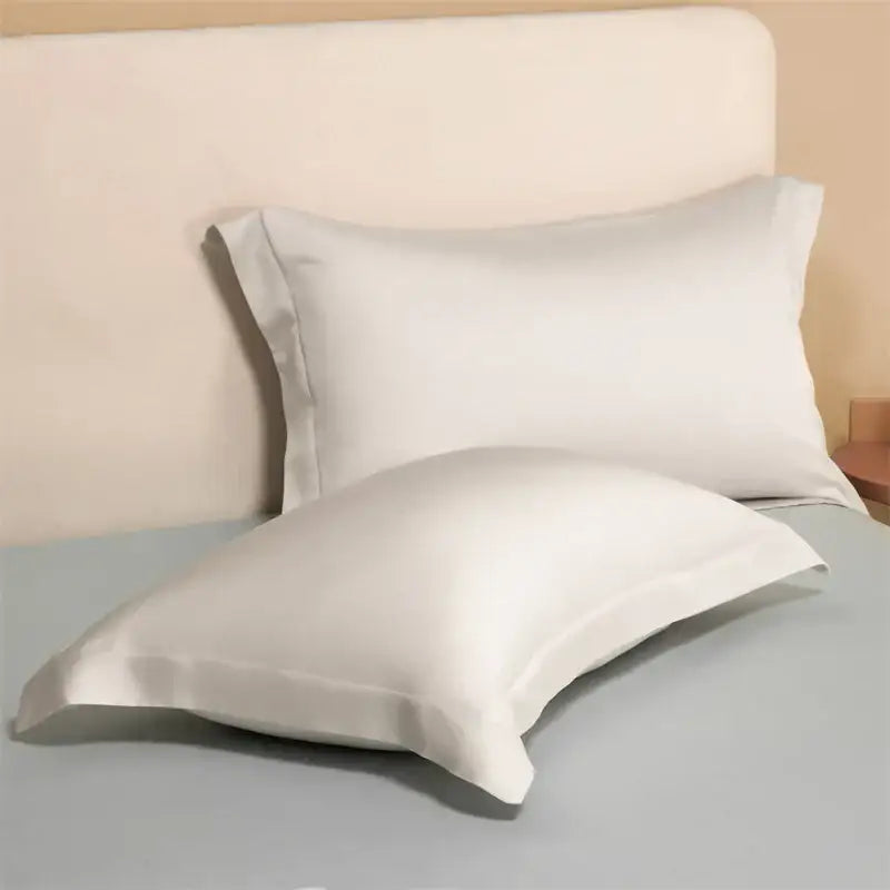 White silk pillowcases with smooth glossy finish in a lavender egyptian cotton pillowcase set for bedroom bedding covers