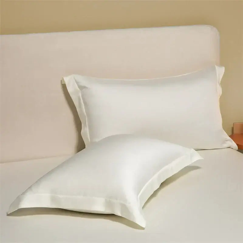 White satin egyptian cotton pillowcase with smooth glossy finish and neatly stitched edges in cotton pillowcase set