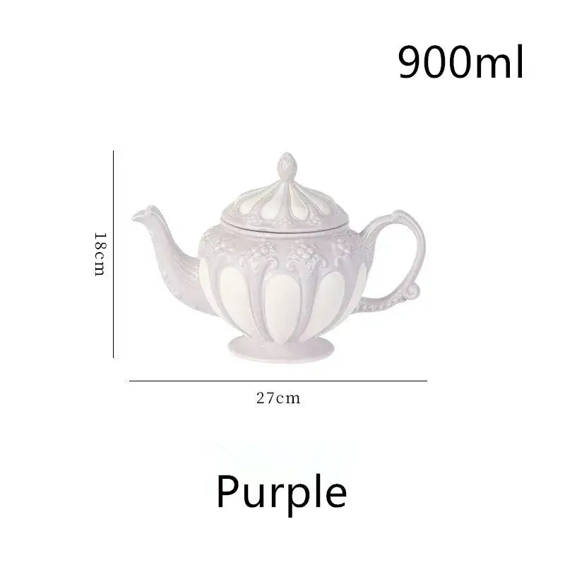 A purple ceramic teapot with ornate floral design and matching lid from decorbites elegant porcelain tea set
