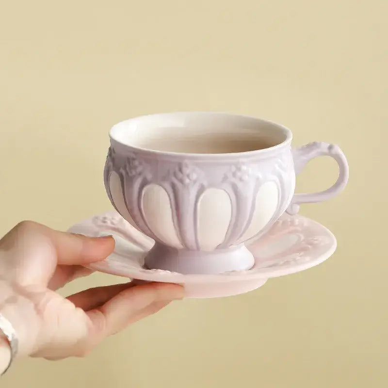 A delicate lavender floral embossed elegant porcelain tea cup with matching saucer from decorbites porcelain tea set