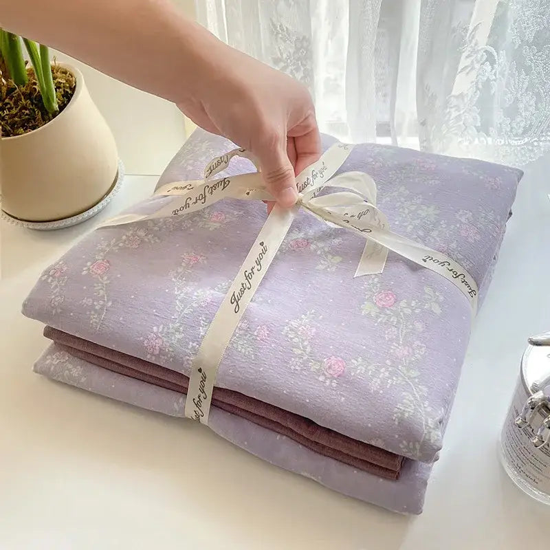 Lavender floral patterned cotton bedding set tied with cream ribbon just for you textured cotton bedding