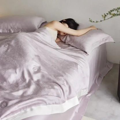Lavender jacquard quilt set with soft satin fabric, subtle embroidery, and crisp white trim by decorbites light luxury