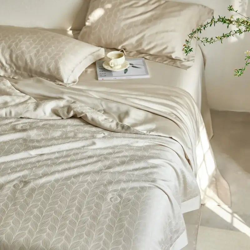 Beige satin duvet cover with subtle leaf pattern in a lavender jacquard quilt set by decorbites light luxury