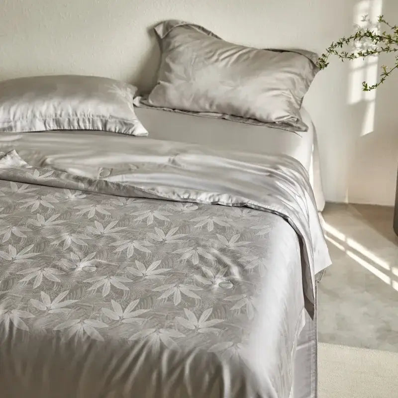 Silver-gray satin duvet cover with subtle leaf pattern in lavender jacquard quilt set from decorbites light luxury collection