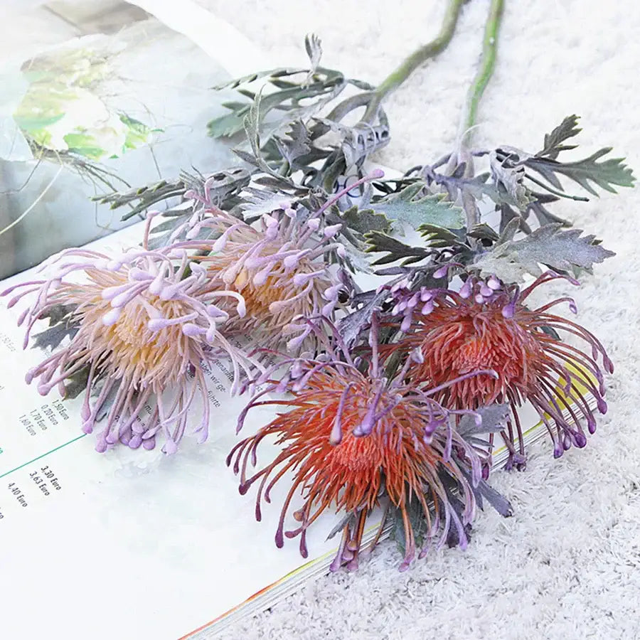 Lavender and orange artificial crab claw branch with realistic textured petals and green stems for decorbites artificial crab decor